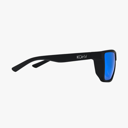 Black sunglasses with a matte finish and vibrant blue mirrored lenses, featuring the brand name 'KOHV' printed in white on the temple, set against a plain light gray background.