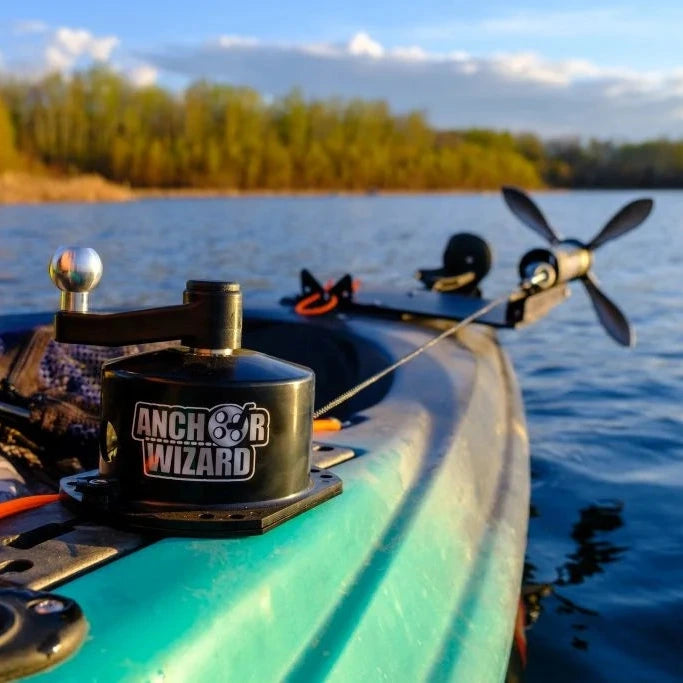 Kayak with Anchor Wizard anchor system on a calm lake