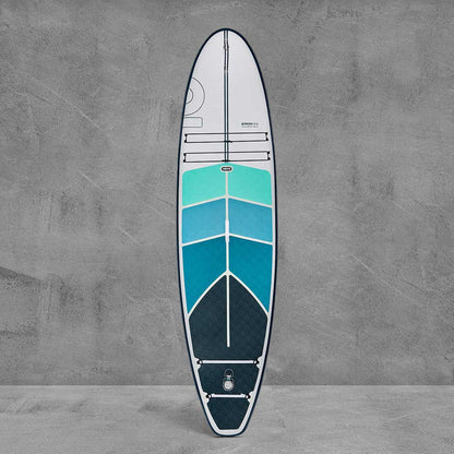 Sup board with blue and white design on a gray background