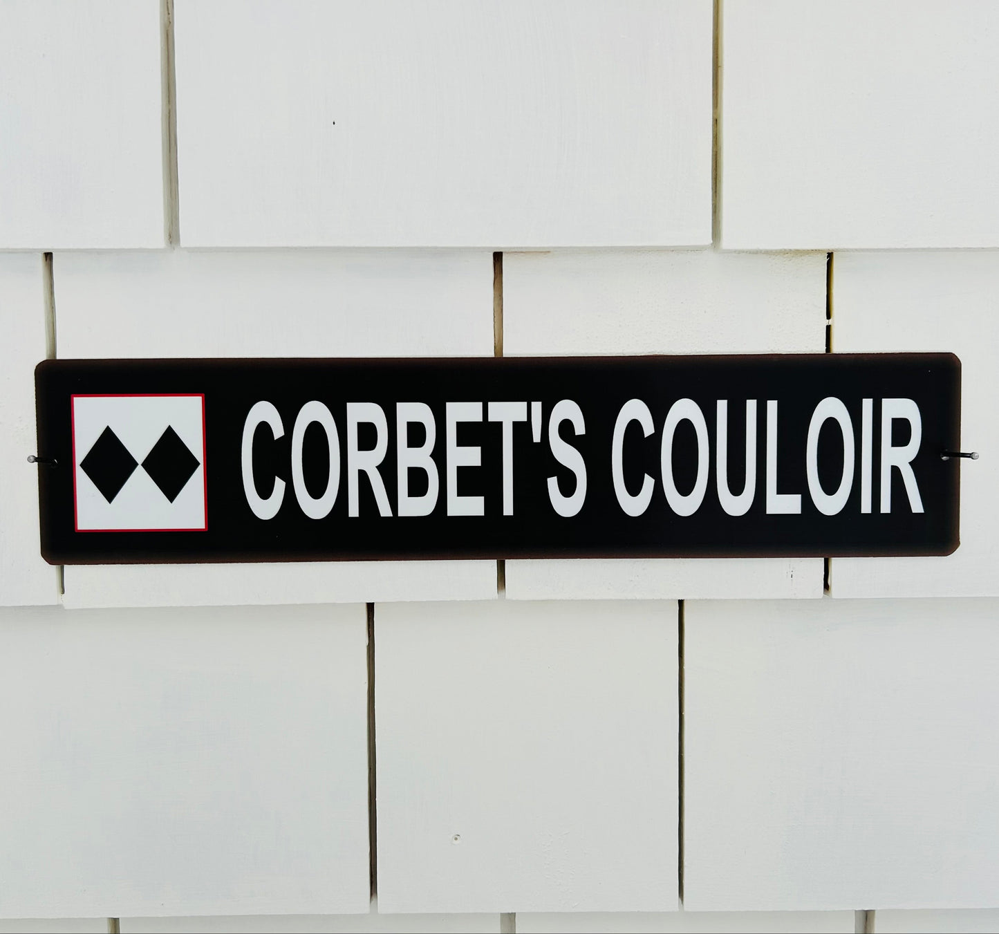 Ski Trail Sign that says Corbet's Couloir at Jackson Hole (Souvenir for Wall)