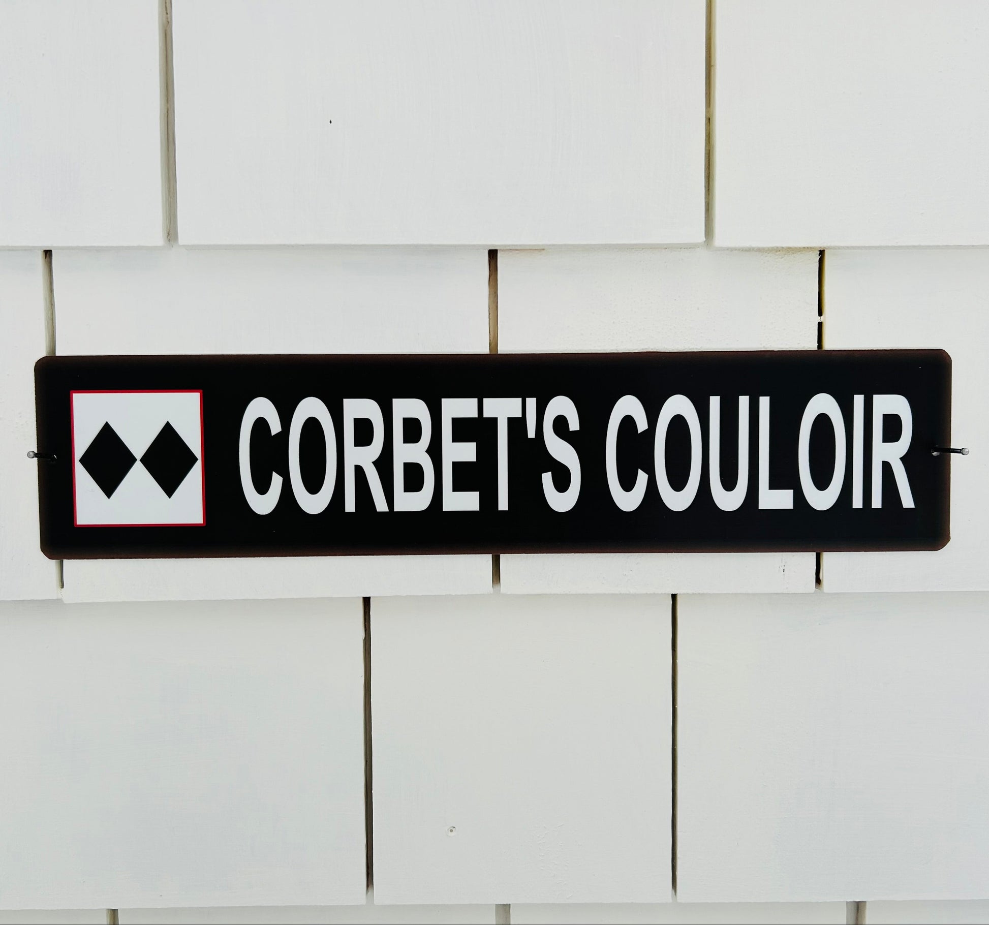 Ski Trail Sign that says Corbet's Couloir at Jackson Hole (Souvenir for Wall)