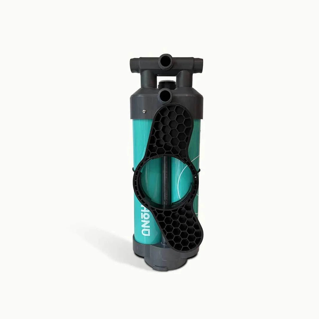 Turquoise and black bike bottle holder on a white background